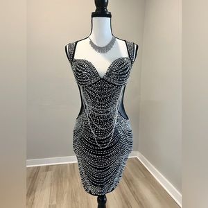 Black party dress w/silver hanging rhinestone chains, black mesh on sides.